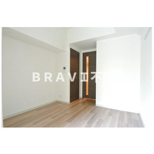 エス・キュート京町堀　BRAVI不動産の洋室