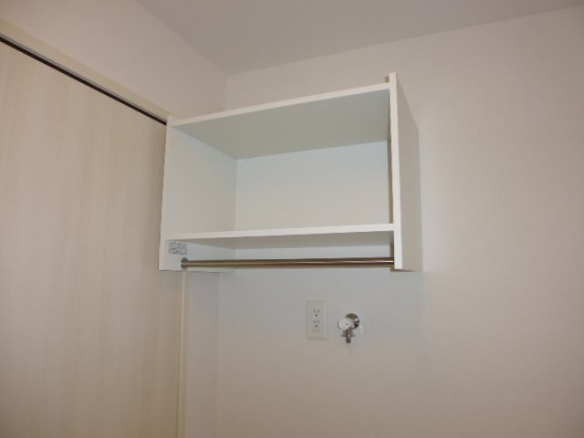 フォーチューン真壁Ｄの洗面所|洗濯機上棚