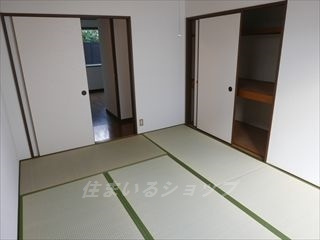 広島市安佐北区口田４丁目のアパートの寝室