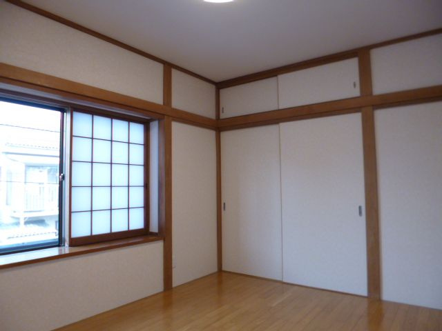 富士見町貸家の洋室