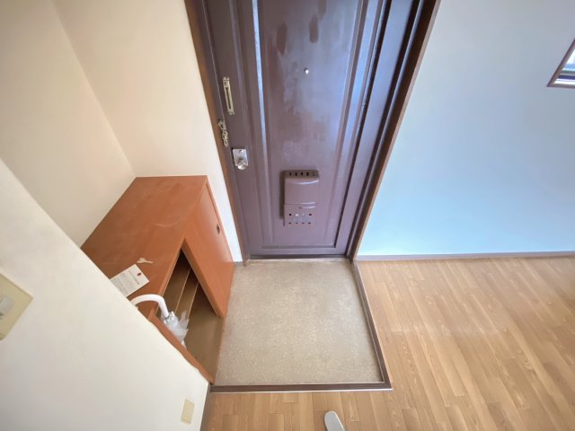 メゾンドクミノキの玄関