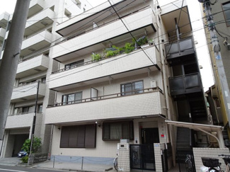 【外観】 | 菅長ビル　鉄筋コンクリート造の外観タイル張りマンション！日暮里・鶯谷・三河島駅からそれぞれ徒歩１０分。日暮里中央通りと尾竹橋通りから少し中に入った静かな環境です！駐輪場あります！