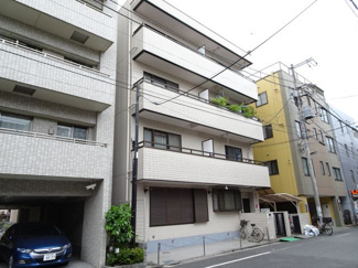 【外観】 | 菅長ビル　鉄筋コンクリート造の外観タイル張りマンション！日暮里・鶯谷・三河島駅からそれぞれ徒歩１０分。日暮里中央通りと尾竹橋通りから少し中に入った静かな環境です！駐輪場あります！