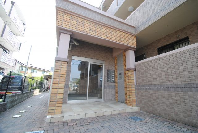 ソレイユ合川の玄関