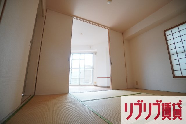 クリスタルスクエアINOHANAの寝室