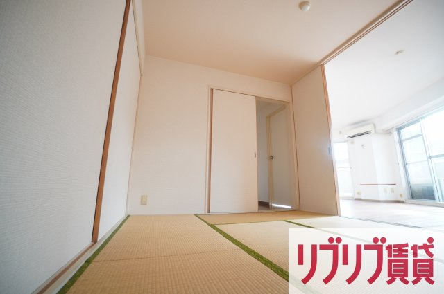 クリスタルスクエアINOHANAの寝室