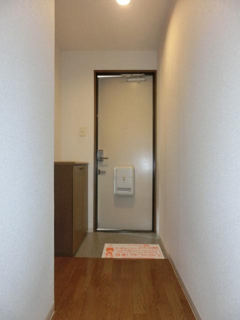 ロイヤルカーサ姫里の玄関