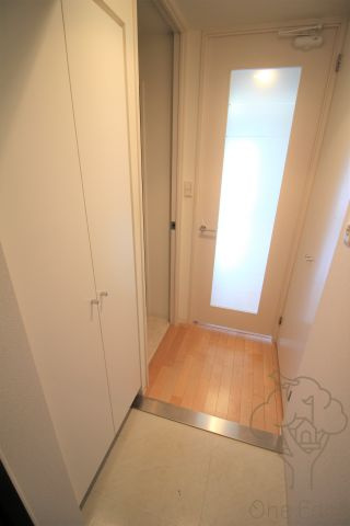 レジュールアッシュ天神橋の玄関