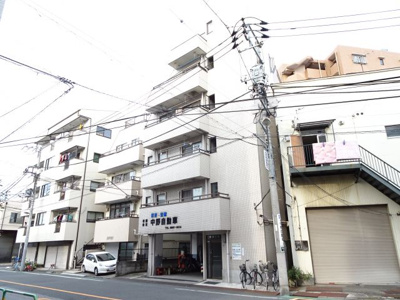 【外観】 | 中野ニューハイツ | 中野ニューハイツ　鉄骨造の外観タイル張りマンション！鶯谷駅から徒歩９分・入谷駅から徒歩９分・日暮里駅から徒歩１５分！コンビニが近くにあります！ワンフロア２世帯！全室角部屋で窓の多い２面採光！