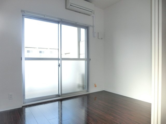 大阪市淀川区十三東１丁目の賃貸マンションの洋室