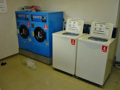 【その他共用部分】 | ミングルAP.栗谷三番館 | コインランドリー(有料)を完備しています♪雨の日のお洗濯にも便利ですね☆