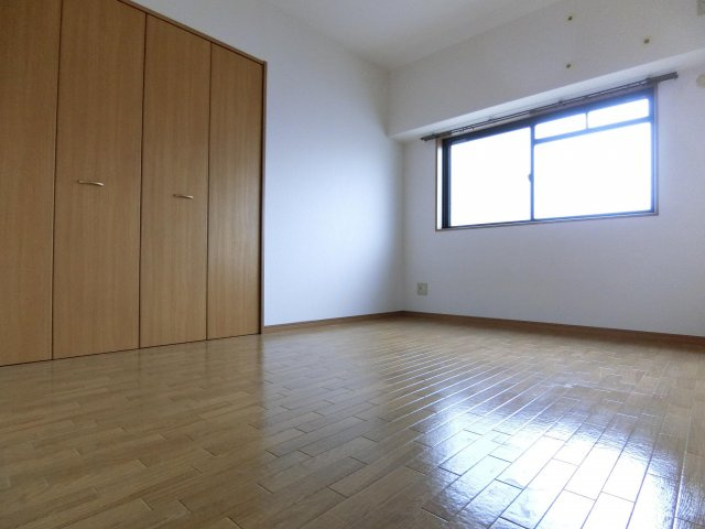 ルヴニール北野田の寝室