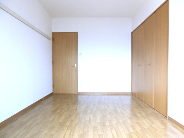 ルヴニール北野田の洋室