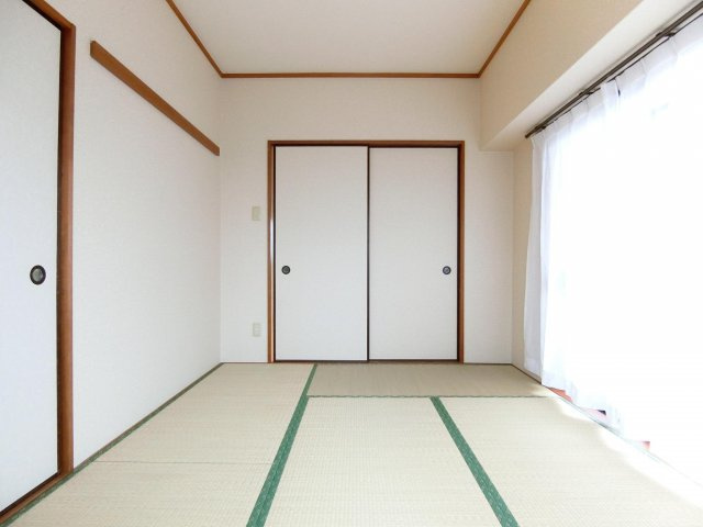 ルヴニール北野田の洋室