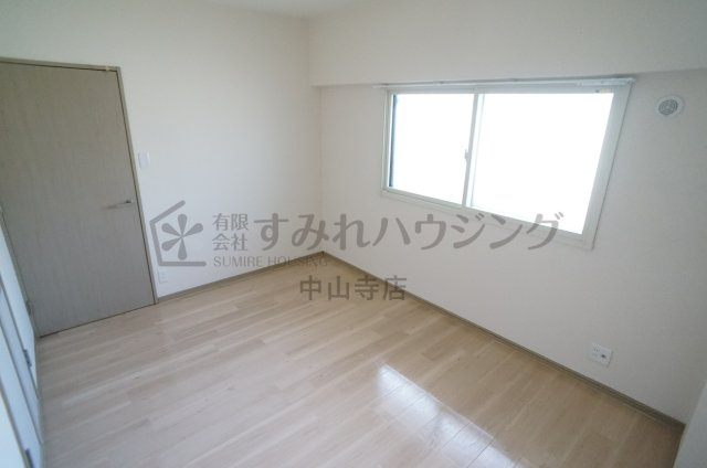 シャルマンコーポ荒牧の寝室