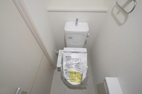 セイワパレス京町堀　BRAVI不動産のトイレ|【セイワパレス京町堀】落ち着いた色調のトイレです