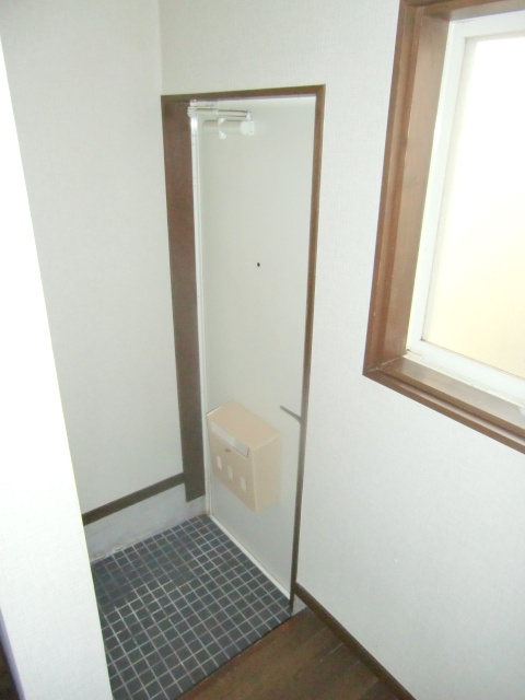 北雄ハイツの玄関