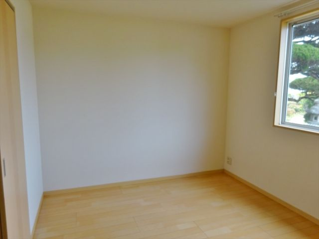 サニーハイツ勝谷の洋室