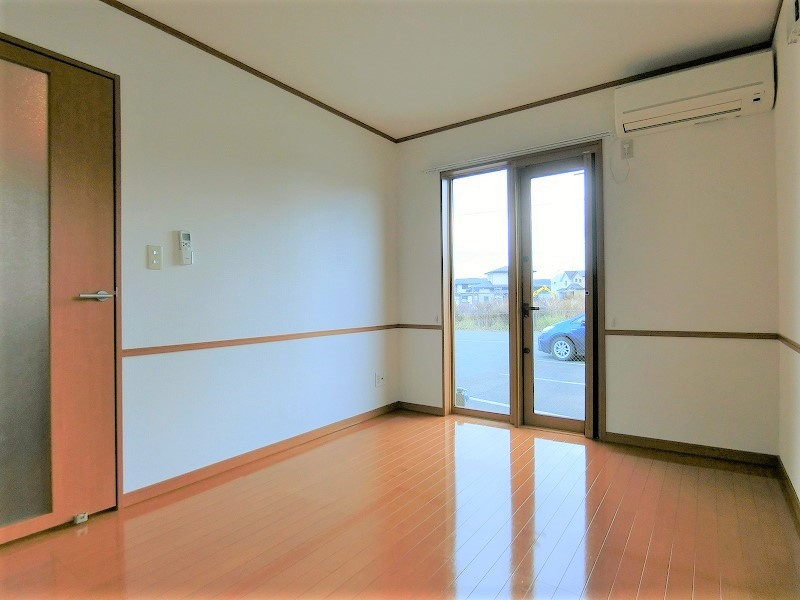 タウンハウスＳＡＩＫＡＷＡⅡの居間・リビング