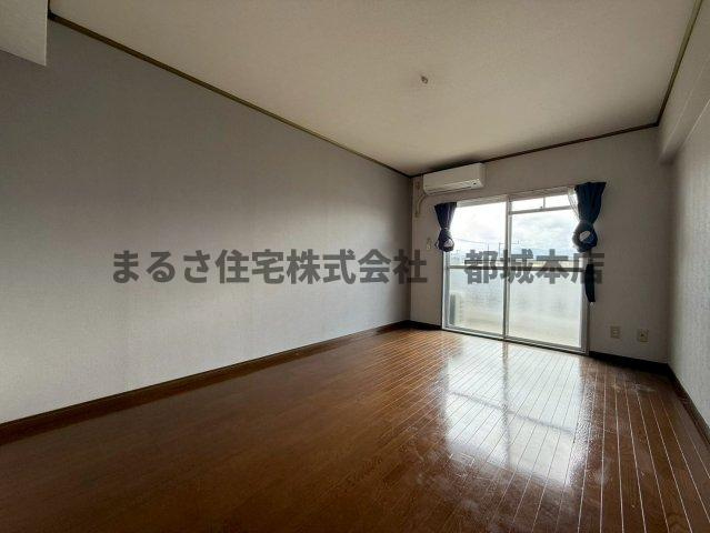 サンライズ都北の居間・リビング|302の写真です