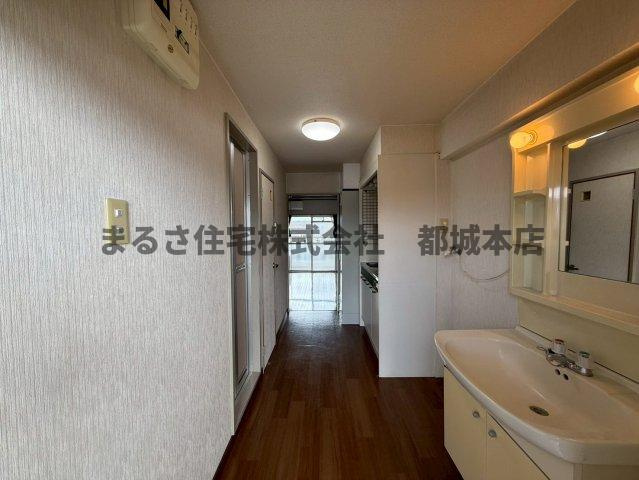 サンライズ都北の玄関|302の写真です