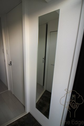 セレニテ福島カルムの玄関