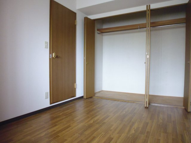 オーシャンビュー江井ヶ島の洋室