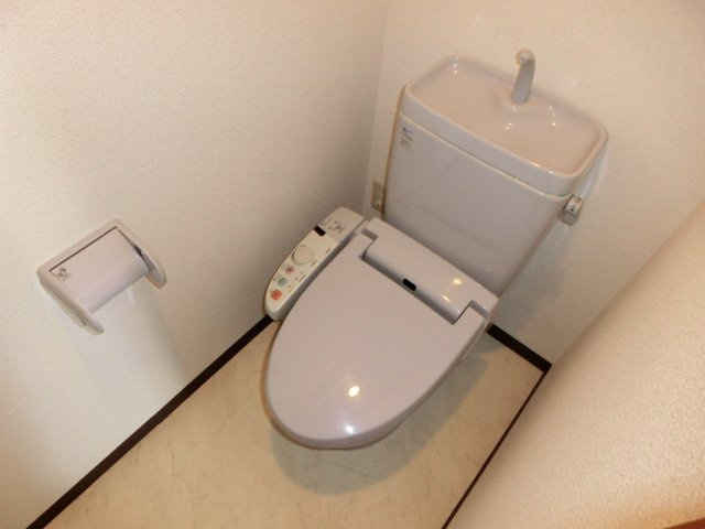 大阪市淀川区木川西２丁目の賃貸マンションのトイレ