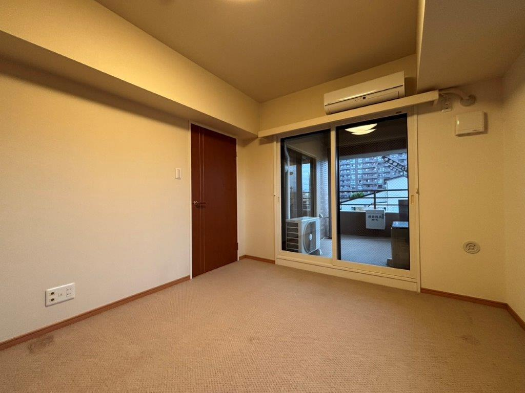 ジェネラスマンション医大前の洋室