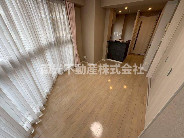 プレミアム菱屋西の洋室