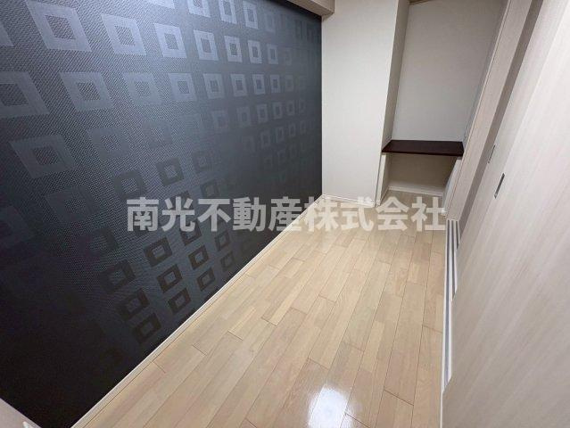 プレミアム菱屋西の洋室