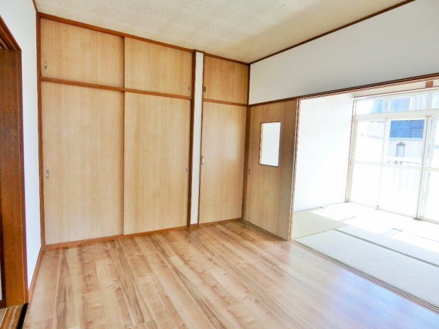 コーポ佐藤の洋室
