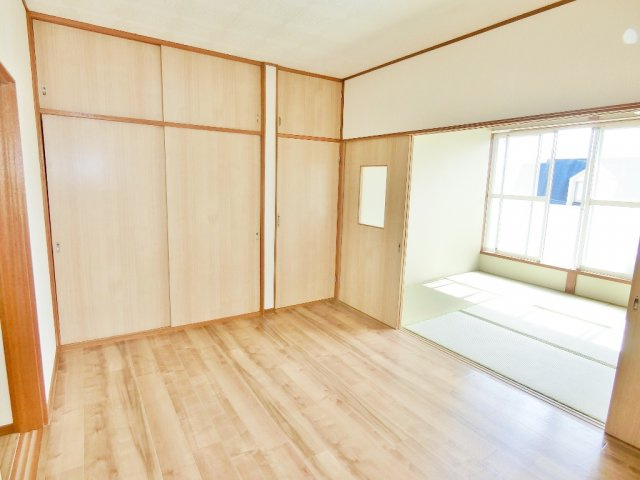 コーポ佐藤の洋室