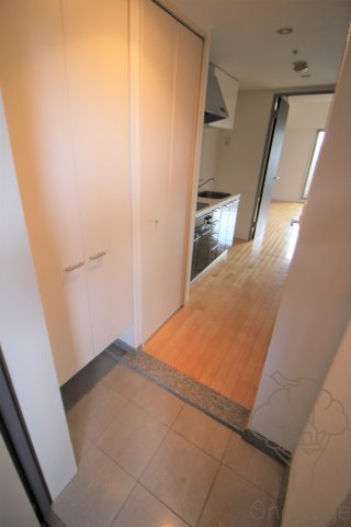 レジュールアッシュ福島の玄関