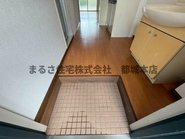サンライズ都北の玄関
