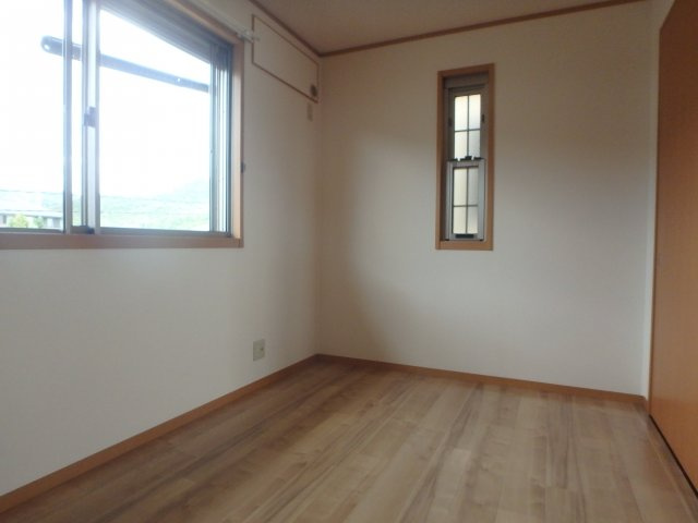 サニーフラット飾東の洋室