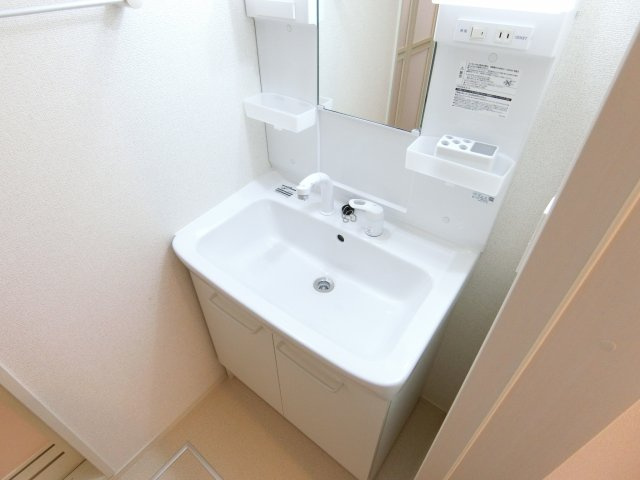 萬の洗面所