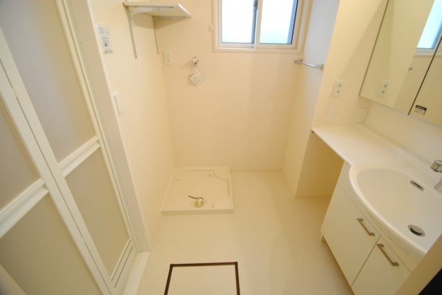 ファシリオンの洗面所|室内洗濯機置場