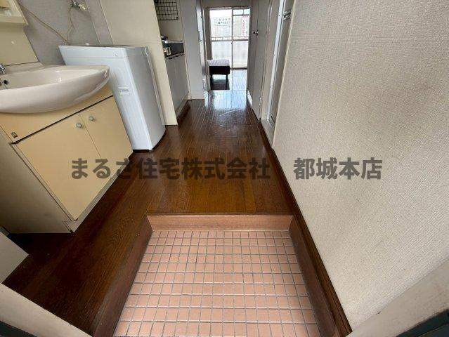 サンライズ都北の玄関