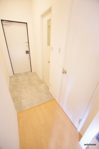 PASSART Bld　仲介手数料無料の玄関