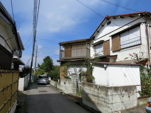 八千代市八千代台東５丁目　売地　建築条件なし　角地の前面道路含む現地写真