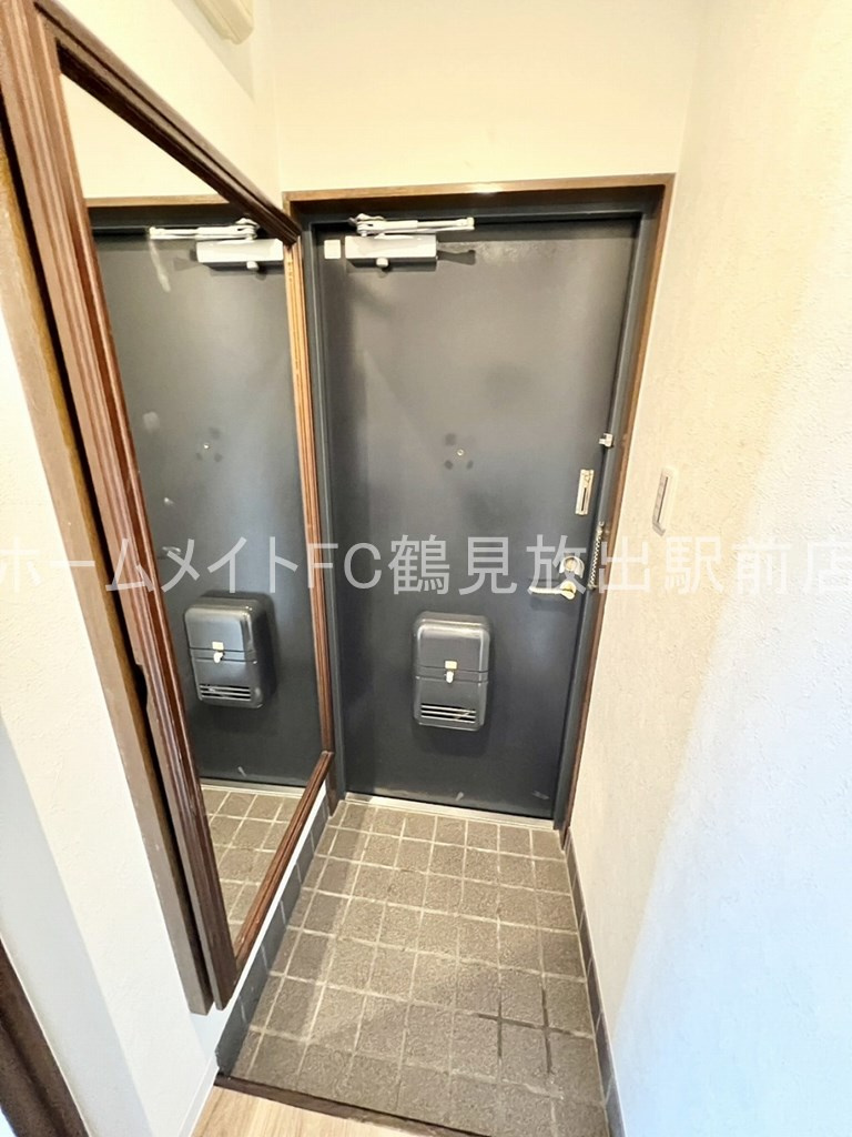 クイーンライフＩＭＡＺＵの玄関