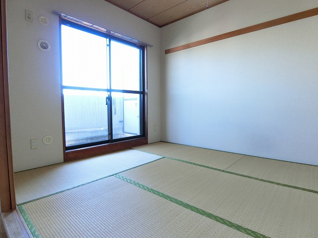 コスモ拝島の寝室