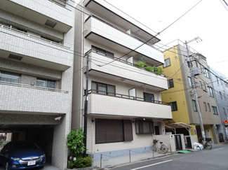 【外観】 | 菅長ビル　鉄筋コンクリート造の外観タイル張りマンション！日暮里・鶯谷・三河島駅からそれぞれ徒歩１０分。日暮里中央通りと尾竹橋通りから少し中に入った静かな環境です！駐輪場あります！