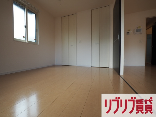 ロイヤルクレッセント西登戸参番館の寝室