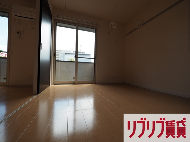 ロイヤルクレッセント西登戸参番館の寝室