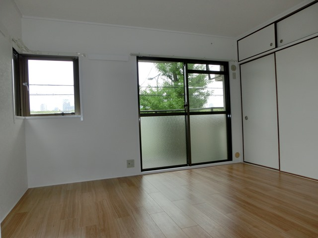 大阪市淀川区十三東１丁目の賃貸マンションの洋室