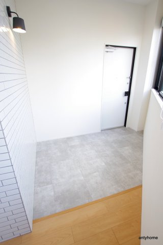 PASSART Bld　仲介手数料無料の玄関