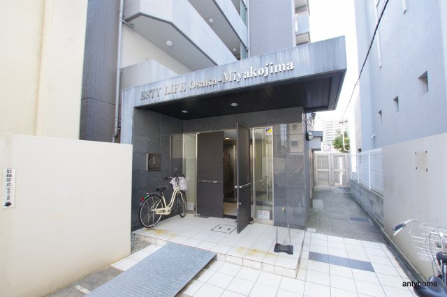 エスティライフ大阪都島　仲介手数料無料のエントランス