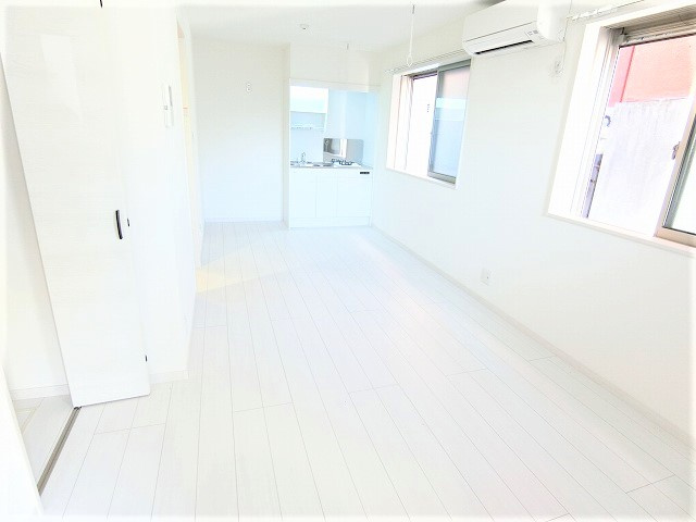 ブエナメゾン福生Cの居間・リビング